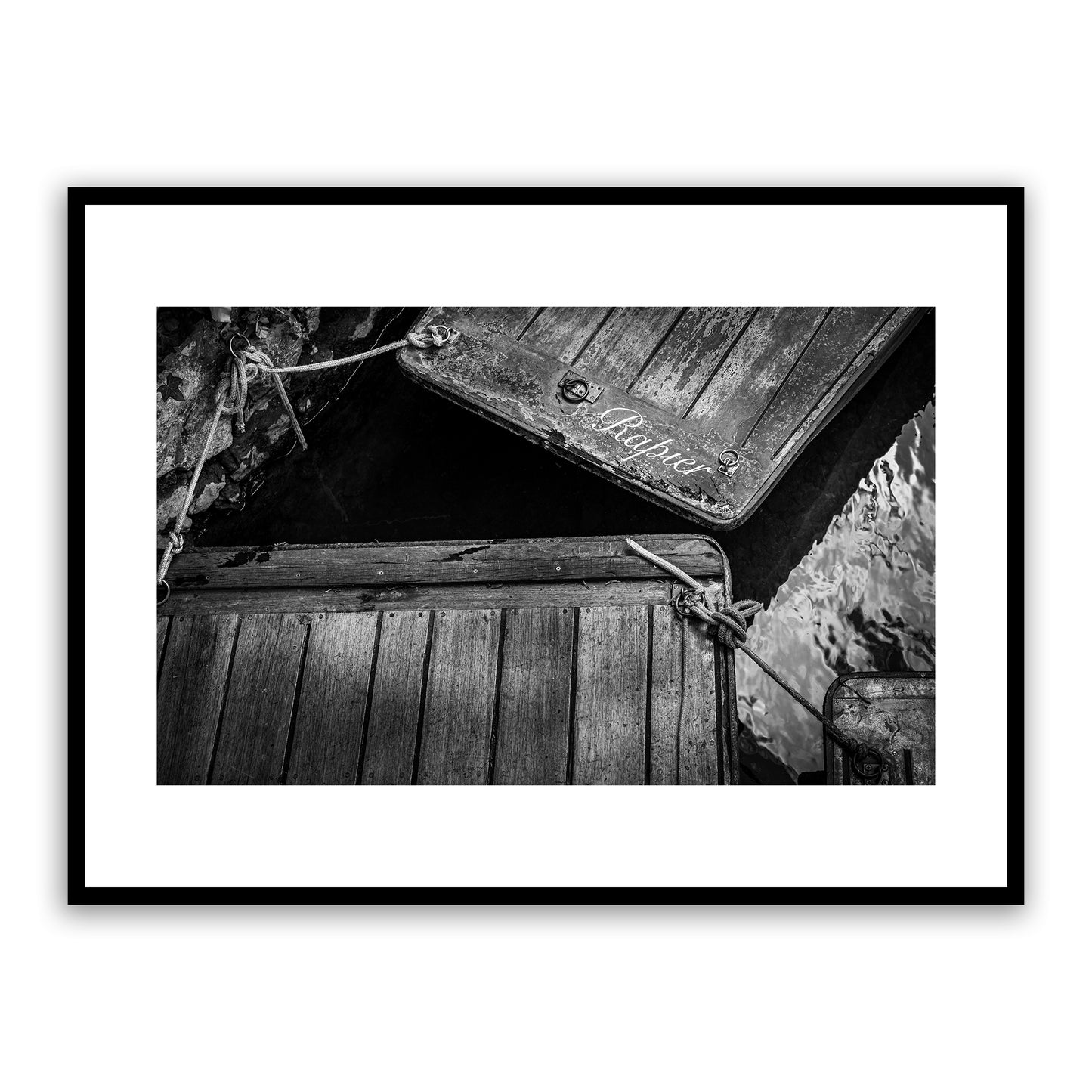 Classic hand-built old wooden punts boats on the historic river Stour, Canterbury, Kent, England. Fine art black and white photography print for sale.