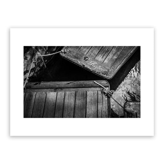 Classic hand-built old wooden punts boats on the historic river Stour, Canterbury, Kent, England. Fine art black and white photography print for sale.