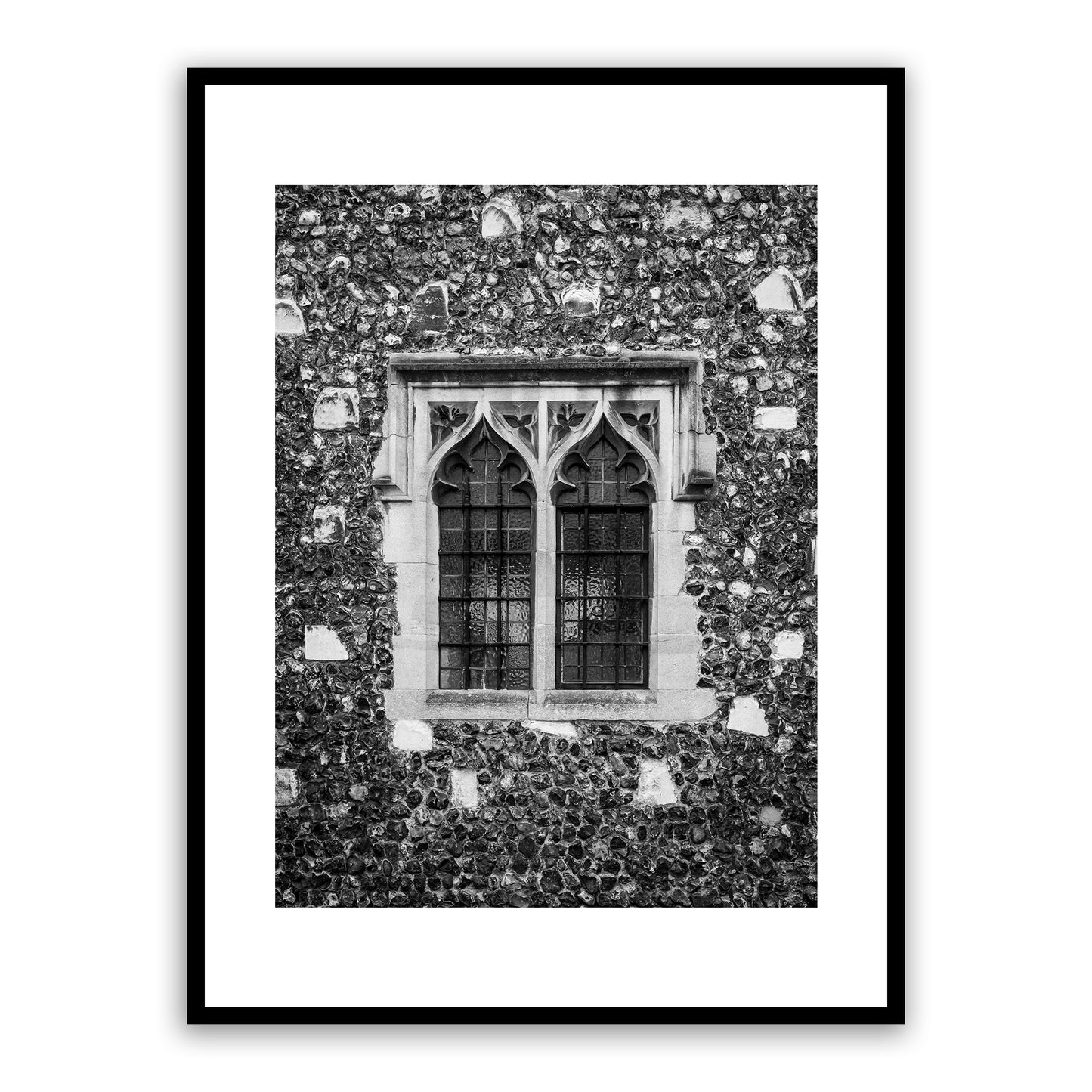 Medieval window in the Borough, the King’s Mile, Canterbury, Kent, England. Many of Canterbury's historic buildings were built in the Gothic architectural style that flourished in England from the 12th to the mid-17th century. Fine art black and white photograph for sale.
