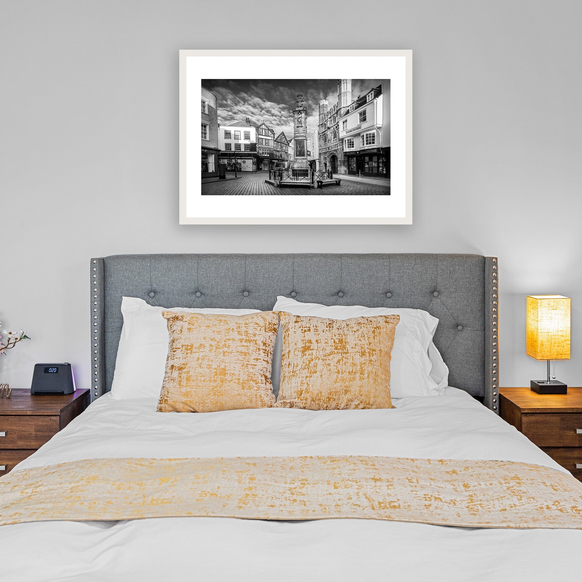 Buttermarket Square, Canterbury, Kent, England. Medieval city. Featuring the Canterbury War Memorial and Canterbury Cathedral's magnificent Christ Church Gate, Grade II listed main entrance to Cathedral precincts and scheduled ancient monument. Fine art black and white photography print for sale.