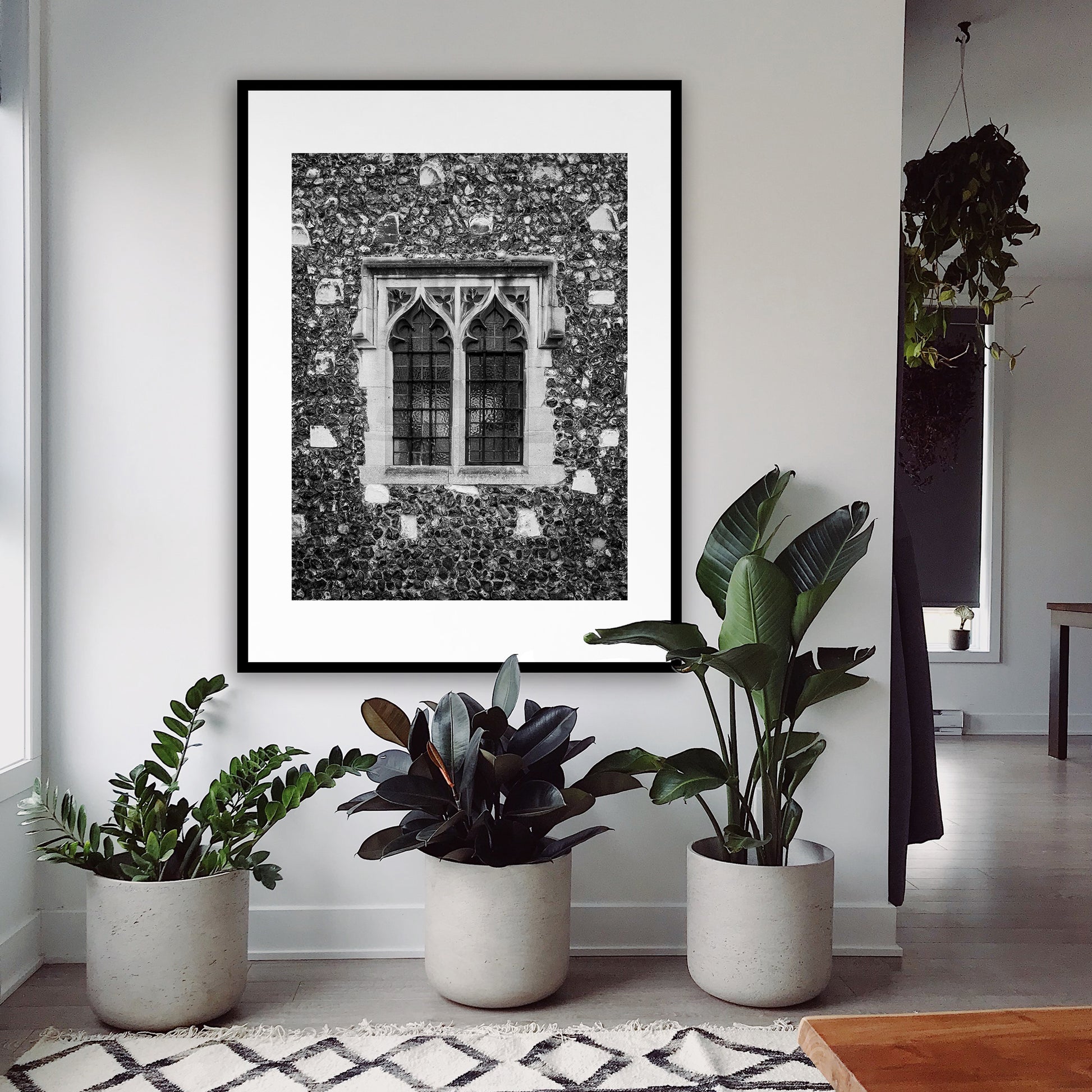 Medieval window in the Borough, the King’s Mile, Canterbury, Kent, England. Many of Canterbury's historic buildings were built in the Gothic architectural style that flourished in England from the 12th to the mid-17th century. Fine art black and white photograph for sale.